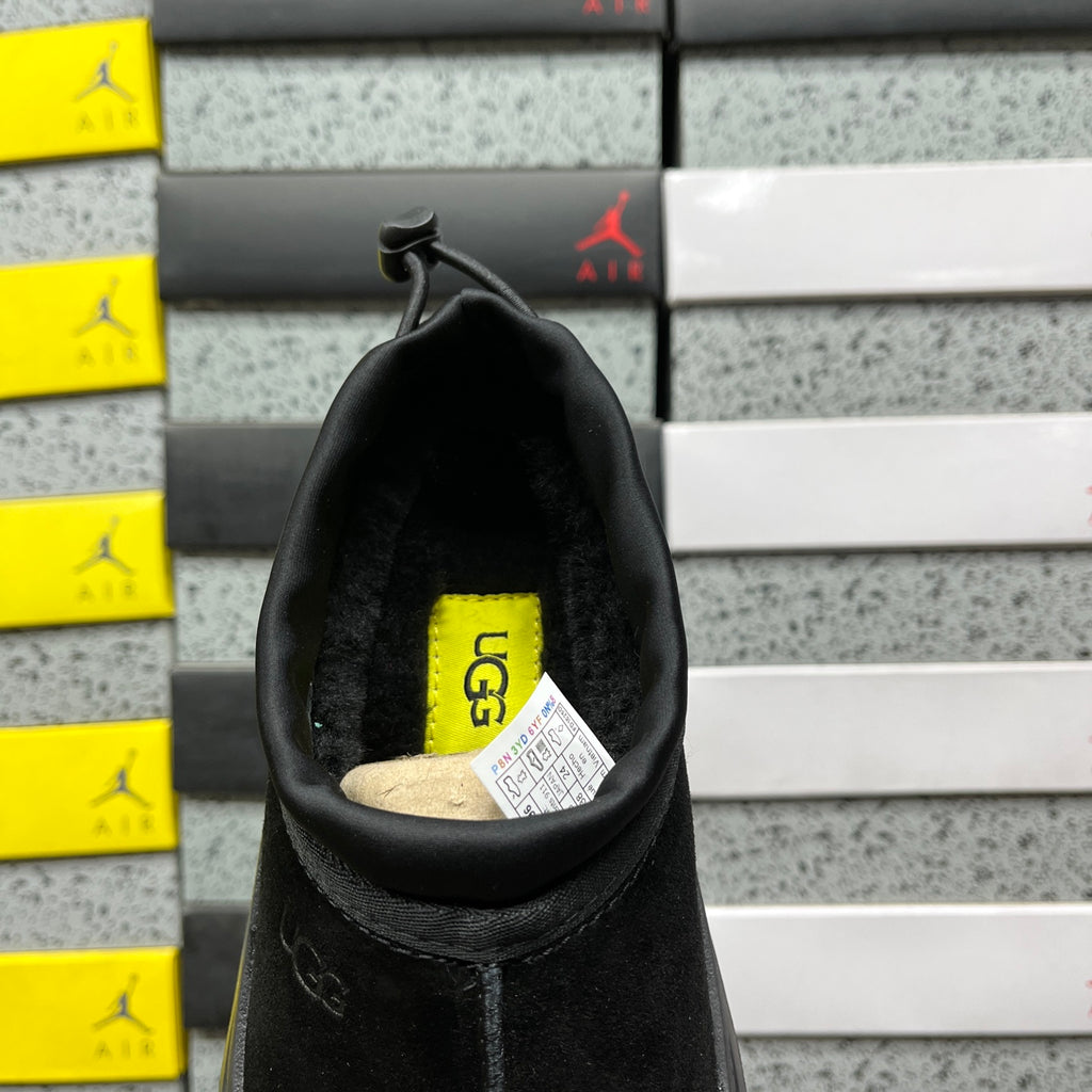 UGG Black Slip-On Platform Shoes