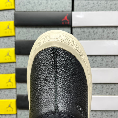 UGG Black & Off-White Slip-On Platform Shoes