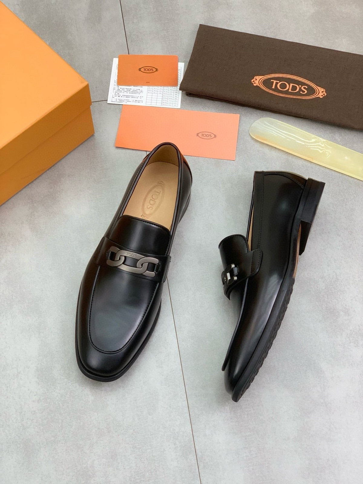 TOD'S Men's Black Metal-Accent Loafers